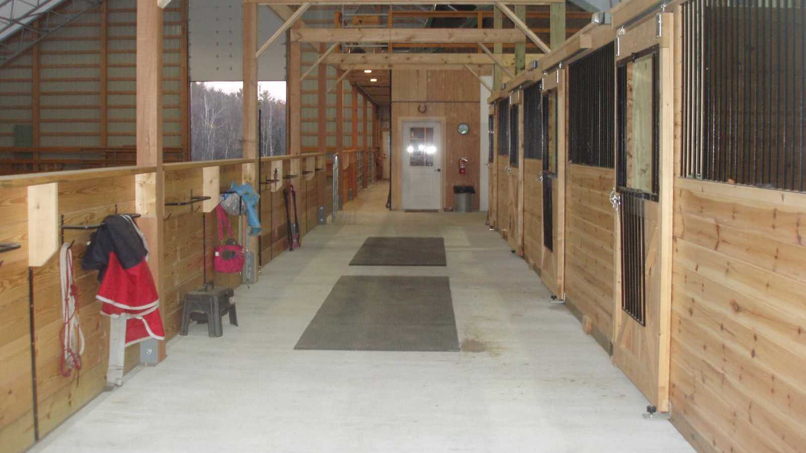 Interior of a 85’ x 120’ fabric roof riding arena.